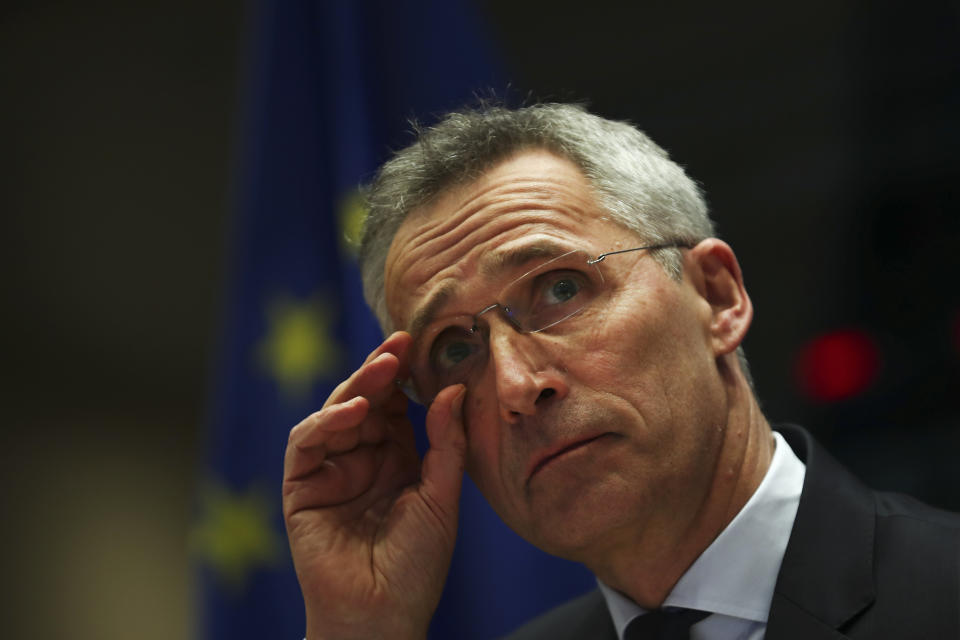 NATO Secretary-General Jens Stoltenberg adjusts his glasses before addressing European Parliament Foreign Affairs committee members at the European Parliament in Brussels, Tuesday, Jan. 21, 2020. Stoltenberg told lawmakers that NATO needs to beef up its military training operation in Iraq once the government in Baghdad requests that it resume work. (AP Photo/Francisco Seco)