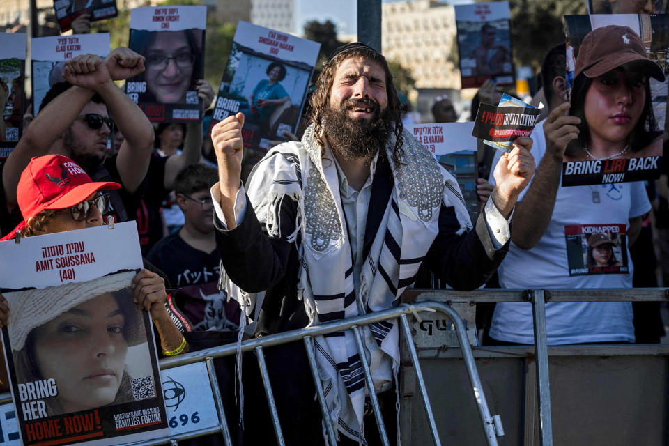 Friends and relatives of Israeli hostages abducted by Hamas demonstrate outside the Knesset in Jerusalem. (Fadel Senna / AFP - Getty Images)