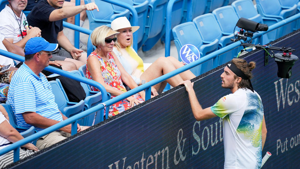 Seen here, Stefanos Tsitsipas interrogates members of the crowd to try and identify the culprit behind the bee noises. 