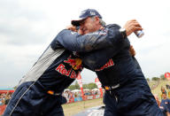 Dakar Rally - 2018 Peru-Bolivia-Argentina Dakar rally - 40th Dakar Edition stage fourteen, Cordoba to Cordoba - January 20, 2018. Carlos Sainz (R) of Spain celebrates with co-pilot Lucas Cruz of Spain after winning Dakar rally. REUTERS/Andres Stapff