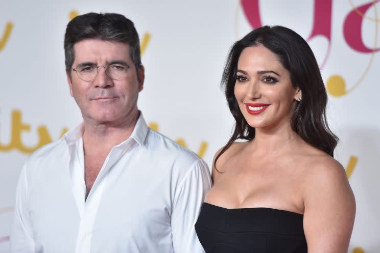 Simon Cowell and Lauren Silverman (WENN)