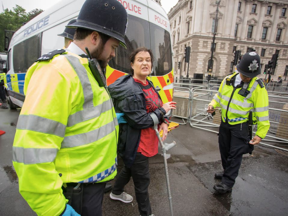 The woman popped the balloon while shouting 'that's a disgrace' (WENN)