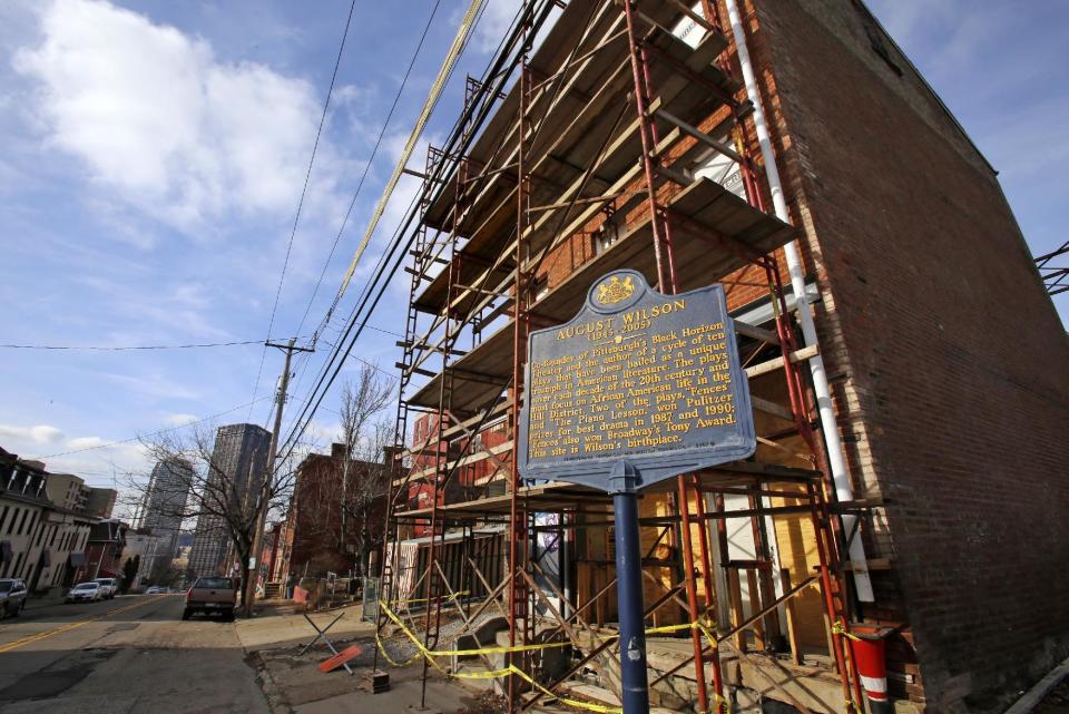 FILE - This Jan. 13, 2017, file photo, shows the birthplace of playwright August Wilson at 1727 Bedford Ave. in the Hill District of Pittsburgh. (AP Photo/Gene J. Puskar, File)