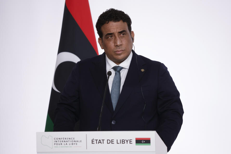 Head of the Presidential Council of Libya Mohamed al-Manfi during a press conference folowing a conference on Libya in Paris Friday, Nov. 12, 2021. France is hosting an international conference on Libya on Friday as the North African country is heading into long-awaited elections next month. (Yoan Valat/Pool Photo via AP)