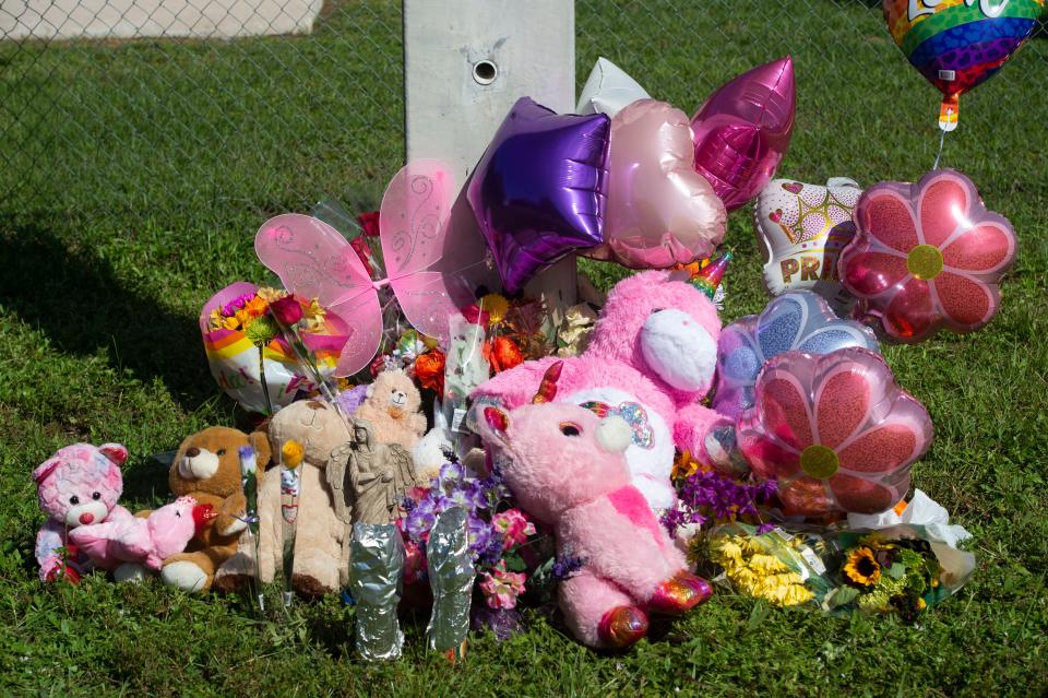 A memorial for Yaceny Berenice Rodriguez-Gonzalez, a 10-year-old girl who was killed by a hit and run driver, grows on Friday, Sept. 24, 2021, on Oleander Avenue at Skylark Drive in Fort Pierce. 