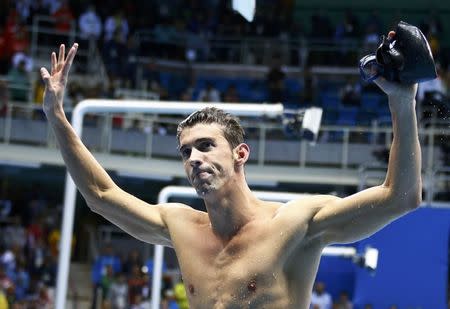2016 Rio Olympics - Swimming - Final - Men's 200m Individual Medley Final - Olympic Aquatics Stadium - Rio de Janeiro, Brazil - 11/08/2016. Michael Phelps (USA) of USA reacts after winning. REUTERS/David Gray