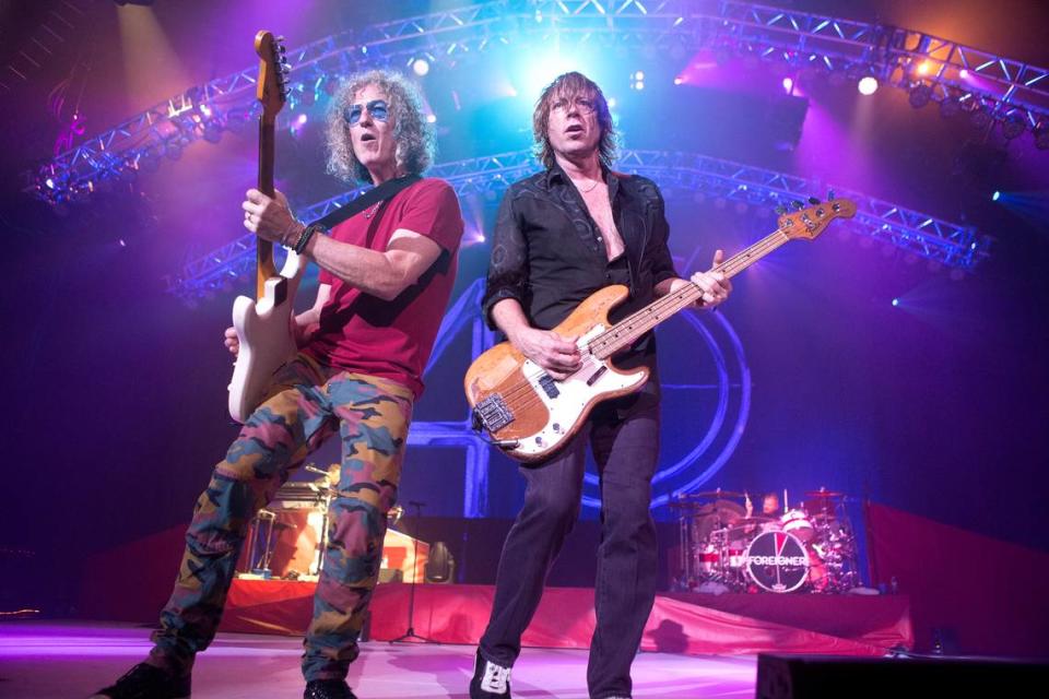 Bruce Watson, left, and Jeff Pilson of the band Foreigner perform in concert during their 40th Anniversary Tour in Camden, New Jersey, in 2017.