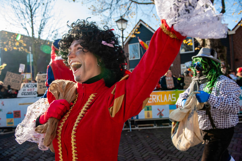 Not all zwarte piets are completely covered in black paint. (Getty Images)