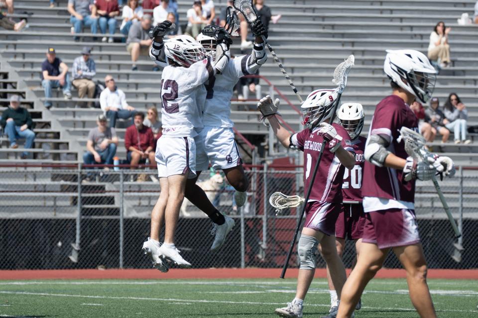 Hudson O'Hara and EJ Garvey, of DBP, celebrate Garvey's first goal of the game against Ridgewood in Ramsey, NJ on Thursday April 6, 2023. 