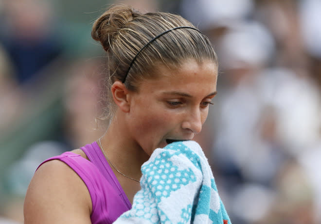 Italy's Sara Errani reacts as she plays with Russia's Maria Sharapova during their Women's Singles final tennis match of the French Open tennis tournament at the Roland Garros stadium, on June 9, 2012 in Paris. AFP PHOTO / PATRICK KOVARIKPATRICK KOVARIK/AFP/GettyImages