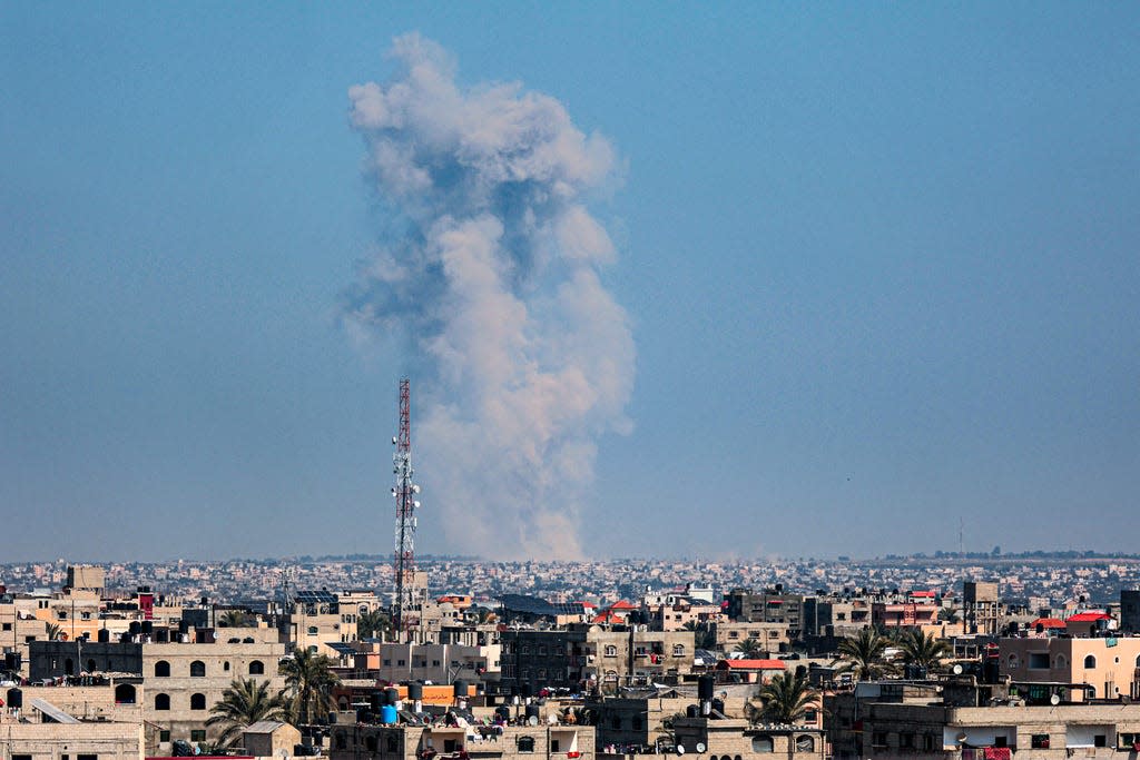This picture taken from Rafah shows smoke billowing following Israeli bombardment of Khan Yunis in the southern Gaza Strip on Feb. 26, 2024, amid the ongoing conflict between Israel and the Palestinian Hamas militant group.
