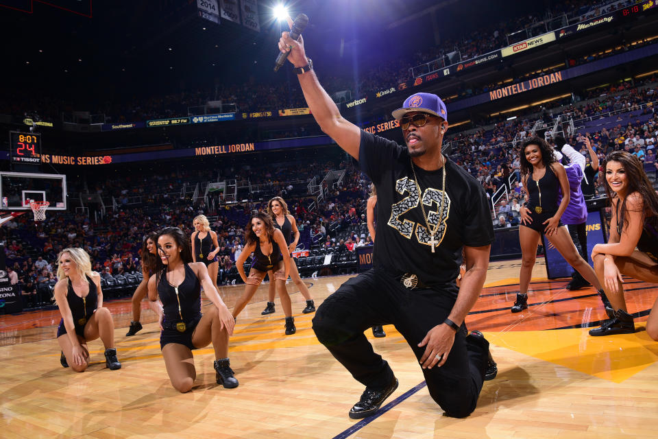 Musician Montell Jordan, seen here showing fans watching a Suns/Lakers game how he does it, is prepared to aid the Cavs in their time of need. (Getty)