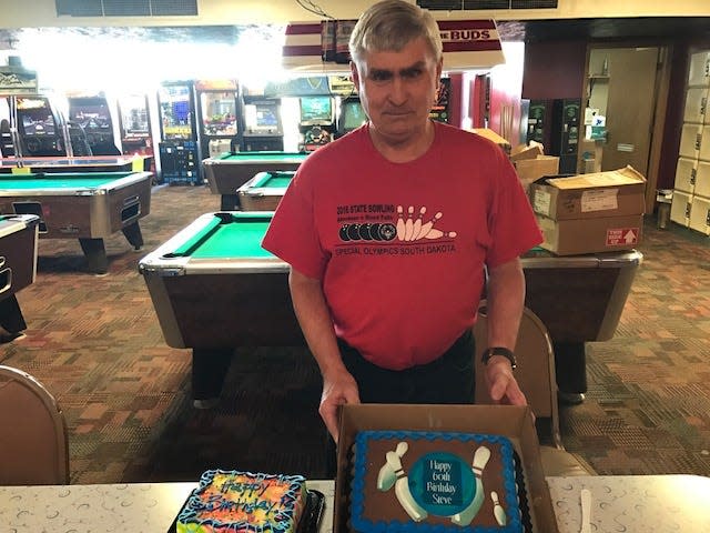 Steve Eide found his second home at Eastway Bowl more than 30 years ago when he started working part-time there through Lifescape. He worked there and bowled in several leagues throughout the week. If he wasn't working or bowling, Eide was watching others bowl and cheering them on. Here, Eide celebrates his 60th birthday at the alley.