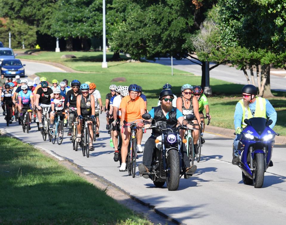 Cyclists ride down Midwestern Parkway during the Ride to Remember event on May 29, 2024, in Wichita Falls.