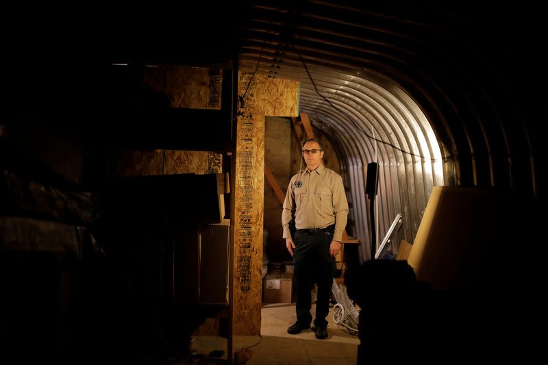 Manager and co-founder of Fortitude Ranch poses for a portrait at his survival camp