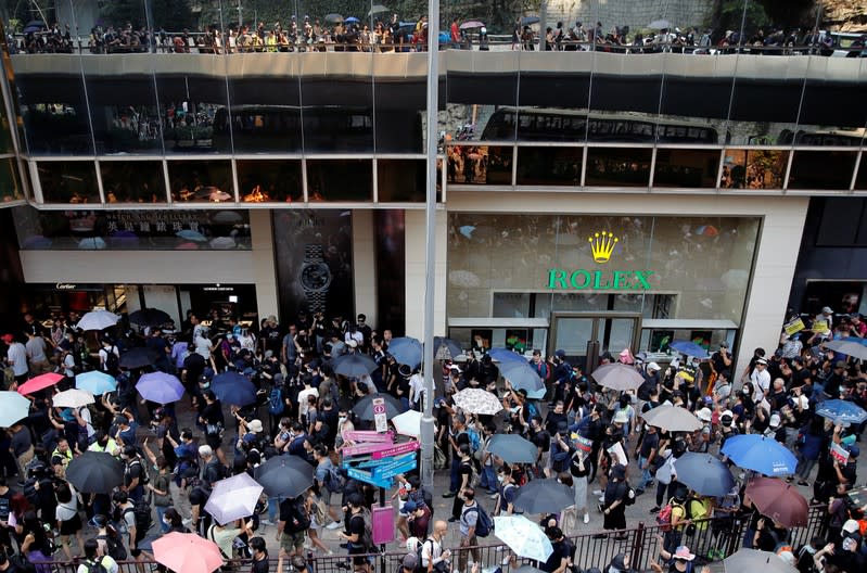 Anti-government demonstrators attend a protest march in Hong Kong