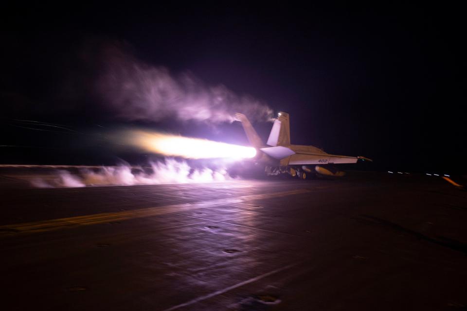 An American aircraft launching from USS Dwight D. Eisenhower on Saturday (AP)
