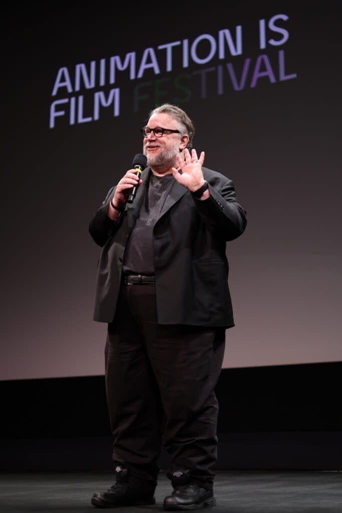 Guillermo del Toro enjoys the standing ovation after his “Pinoccho” film premiere at the Animation Is Film Festival 2022.