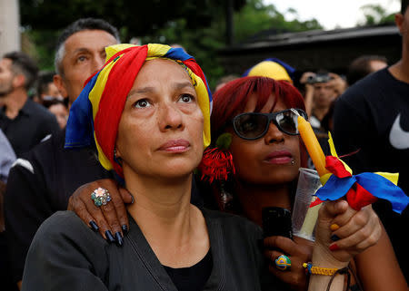 Opposition supporters participate in a candlelight rally against President Nicolas Maduro in Caracas, Venezuela, May 17, 2017. REUTERS/Carlos Garcia Rawlins