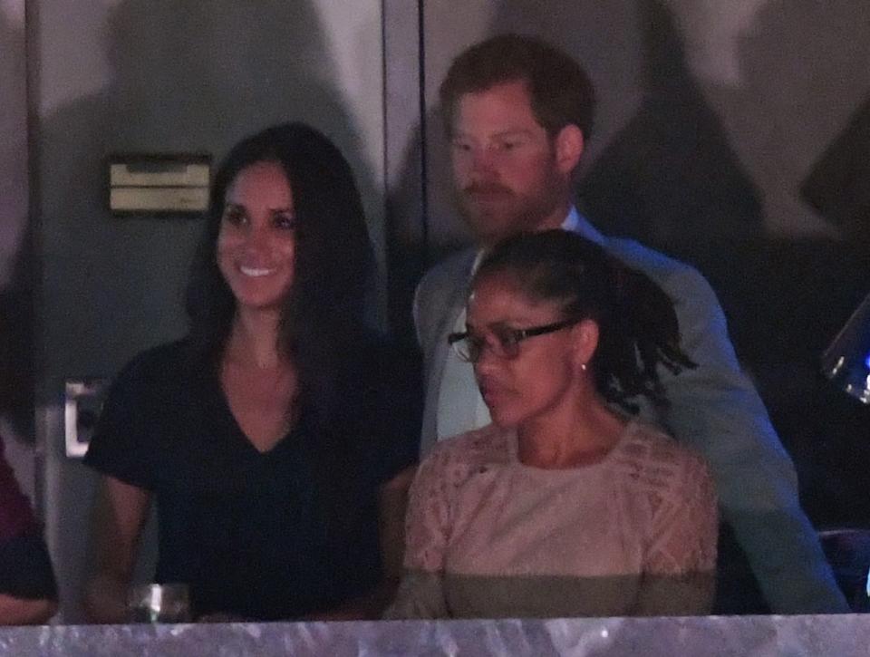<p>While Meghan was initially seated separately from Harry in a private box with her mother and close friends, he stopped by <a href="https://www.townandcountrymag.com/society/tradition/a12458002/meghan-markle-prince-harry-invictus-games-toronto/" rel="nofollow noopener" target="_blank" data-ylk="slk:toward the end of the event to say hello;elm:context_link;itc:0;sec:content-canvas" class="link ">toward the end of the event to say hello</a>. </p>