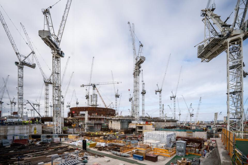 Cranes and scaffold surround the steel and reinforced concrete, partially built dome (Ben Birchall/PA) (PA Wire)