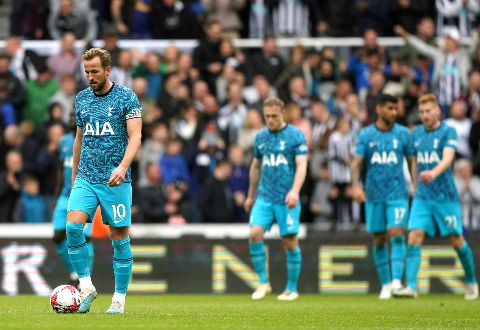 Tottenham's Harry Kane, left, reacts after Newcastle's Callum Wilson, not pictured, scored their side's sixth goal of the game during the English Premier League soccer match between Newcastle United and Tottenham at St. James' Park, Newcastle upon Tyne, England, Sunday, April 23, 2023. (Owen Humphreys/PA via AP)
