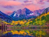 <p>This picture of the sun reflecting on the lake in Aspen, Colorado looks like a painting.</p>