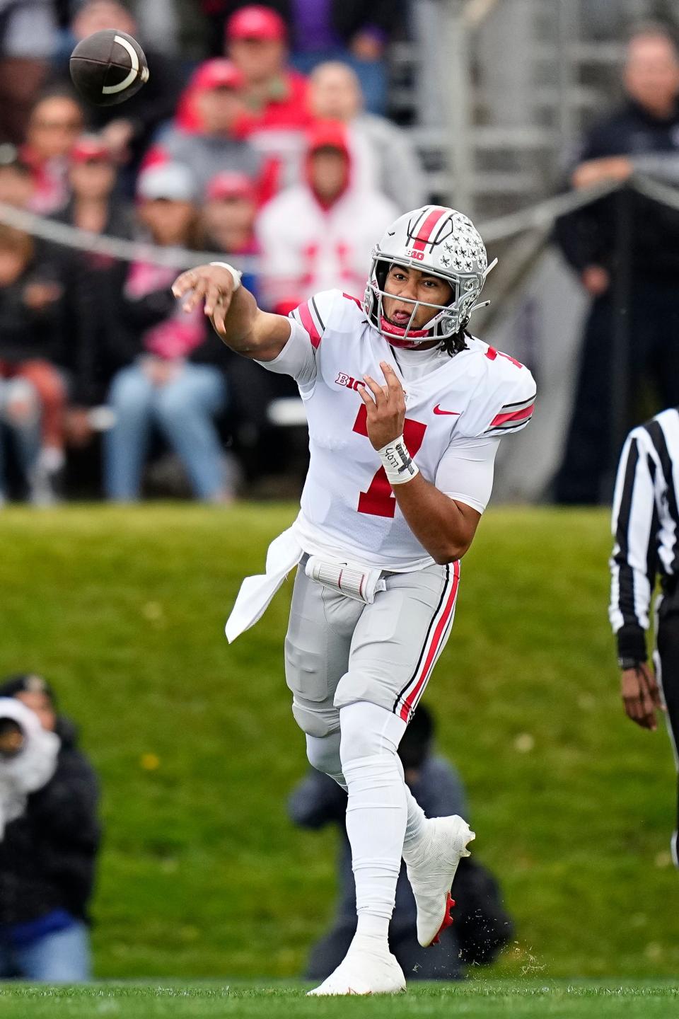 Nov 5, 2022; Evanston, Illinois, USA; Ohio State Buckeyes quarterback C.J. Stroud (7) throws during the first half of the NCAA football game against the Northwestern Wildcats at Ryan Field. Mandatory Credit: Adam Cairns-The Columbus Dispatch