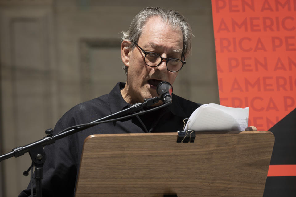 American writer Paul Auster speaks during a reading event in solidarity of support for author Salman Rushdie outside the New York Public Library, Friday, Aug. 19, 2022, in New York. (AP Photo/Yuki Iwamura)