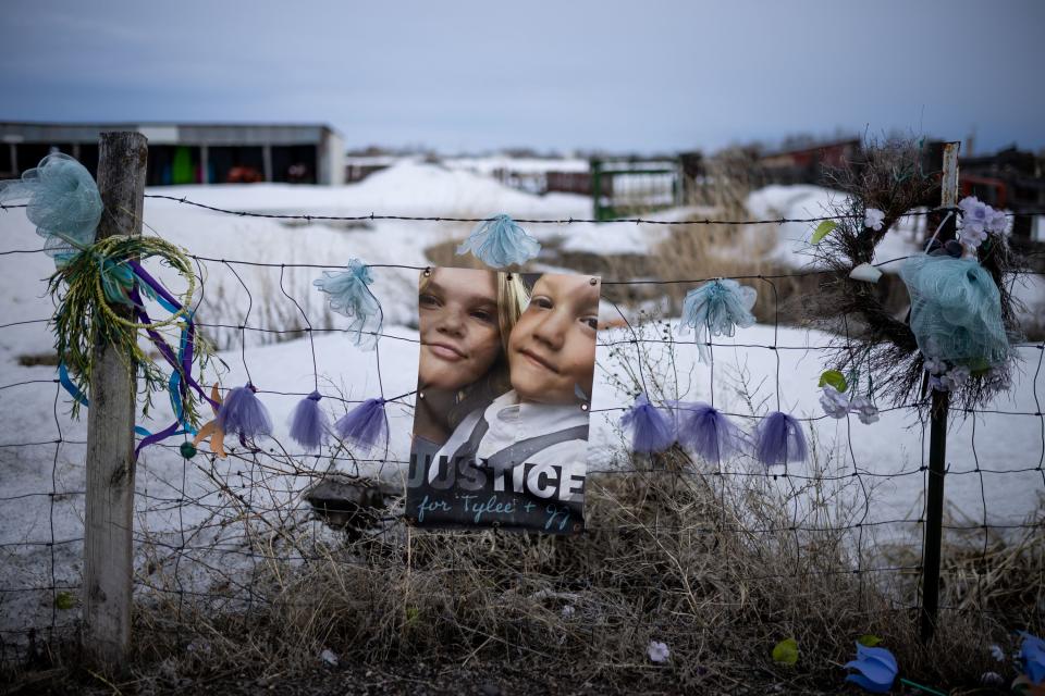 A memorial to Tylee Ryan and JJ Vallow is set up on a neighbor’s fence just across the street from Chad Daybell’s property in Salem, Idaho, on Wednesday, March 29, 2023. | Spenser Heaps, Deseret News