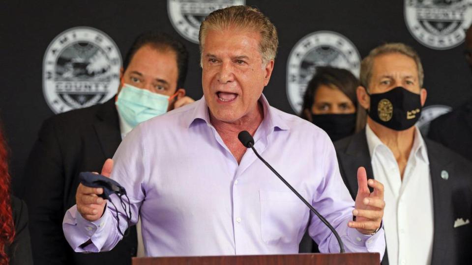 Hialeah Mayor Carlos Hernández joins Miami-Dade County Mayor Daniella Levine Cava during a press conference outside the Government Center to announce county measures to address the recent surge of COVID-19 cases and hospitalizations, and urge the community to get vaccinated on Wednesday, July 28, 2021.