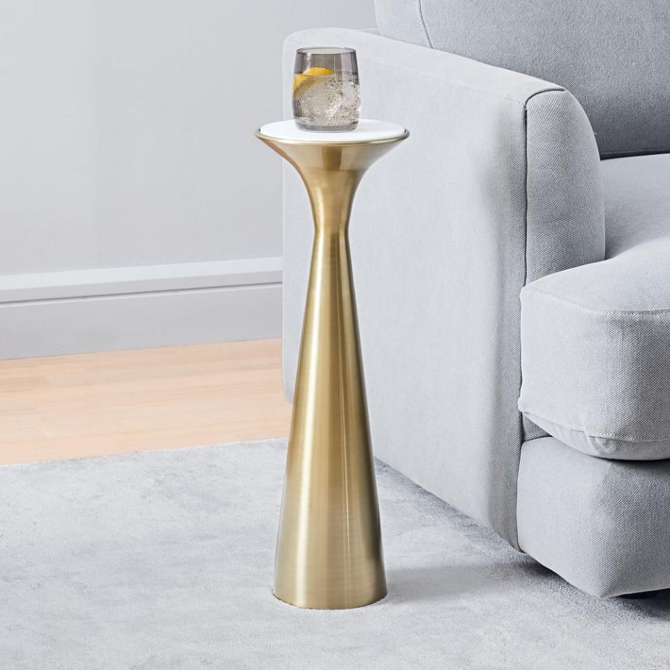 21) Silhouette Pedestal Drink Table