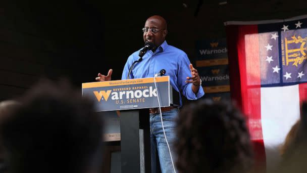 PHOTO: Democratic Senate Candidate Sen. Raphael Warnock gives a speech to supporters during a Get Out the Vote rally at Bearfoot Tavern, Nov. 07, 2022, in Macon, Ga.  (Michael M. Santiago/Getty Images)