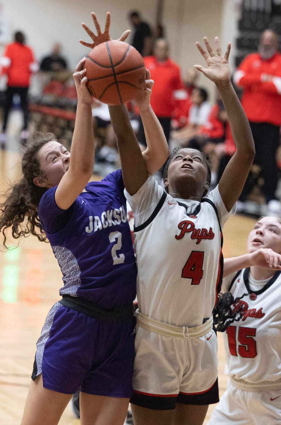 Jackson's Ashley Lahmers is fouled by McKinley's Keziah Herring, Wednesday, Jan. 10, 2024.