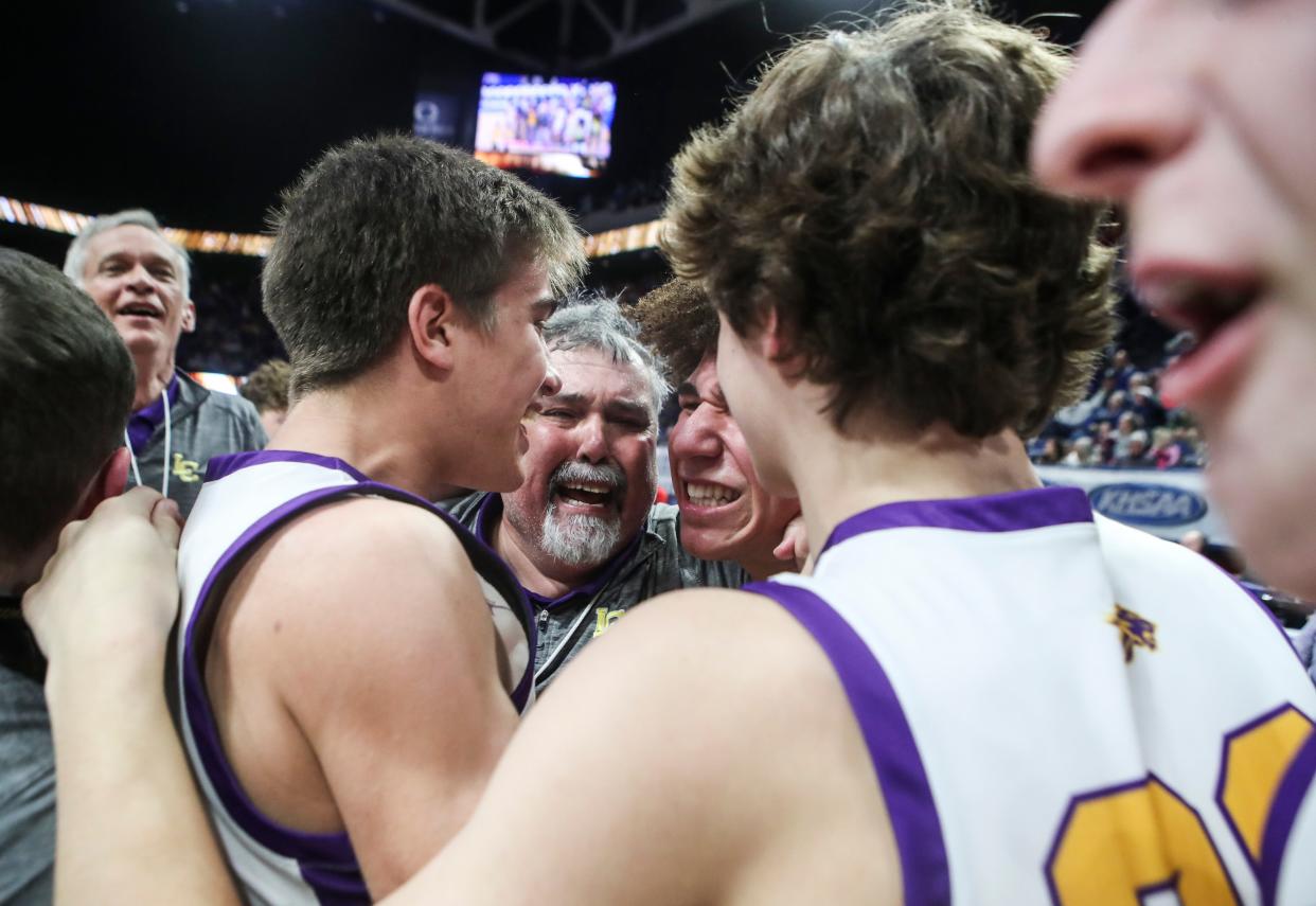 Lyon County head coach Ryan Perry cries after his team won the state title over Harlan County in March at the 2024 UK Healthcare KHSAA Boys' Sweet 16 championship game at Rupp Arena.