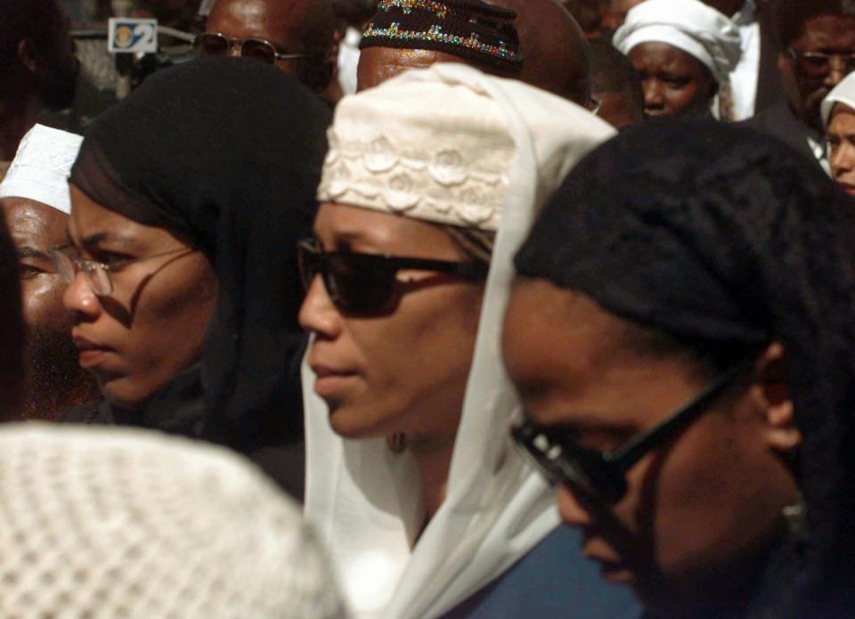 From left, sisters Malikah, left, and Attallah, center, and Malaak Shabazz, after the funeral service for their mother Betty Shabazz at the Islamic Cutural Center of New York Mosque, Friday June 27, 1997. / Credit: AP Photo/Adam Nadel