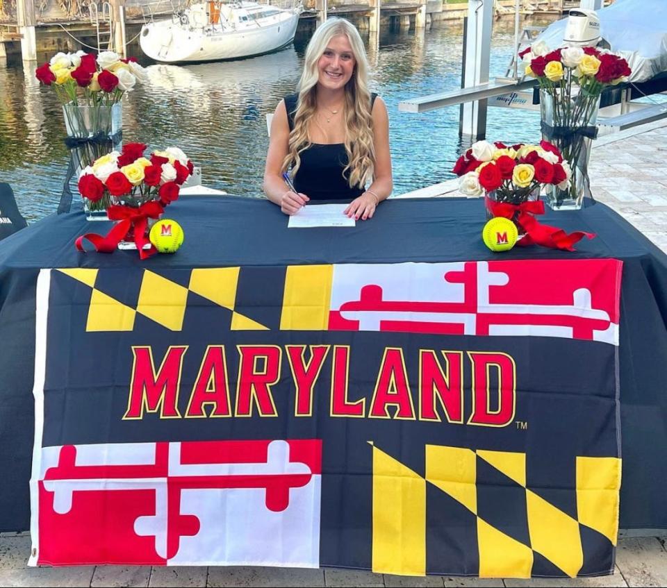 American Heritage-Delray pitcher Aubrey Wurst celebrates her signing to the University of Maryland in November.