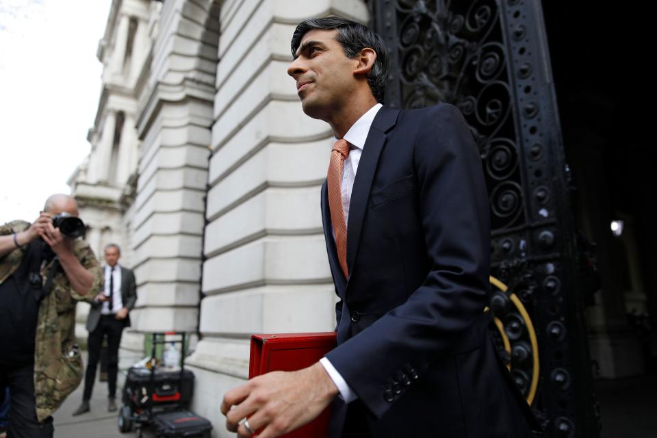 Britain's Chancellor of the Exchequer Rishi Sunak walks to 10 Downing Street in central London on April 8, 2020, ahead of the Government's daily COVID-19 news briefing. - Britain's prime minister began a third day in intensive care battling the new coronavirus, which has struck at the heart of the British government, infected more than 55,000 people across the country and killed nearly 6,200. (Photo by Tolga AKMEN / AFP) (Photo by TOLGA AKMEN/AFP via Getty Images)