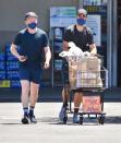 <p>Jesse Tyler Ferguson and Justin Mikita sport coordinated looks while shopping in L.A. on Saturday.</p>