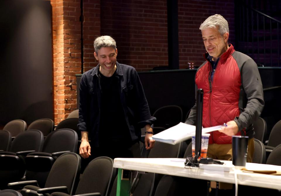 Michael Baron, producing artistic director for Lyric Theatre, right, speaks with playwright Martin Storrow during March 7 rehearsals for "King of Pangaea" at Lyric Theatre in Oklahoma City.