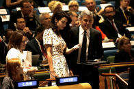 <p>A printed Alexander McQueen to the U.N. seems like a bold choice for the U.N., but the glamorous human rights lawyer totally makes it work. <i>(Photo by Peter Foley - Pool/Getty Images)</i></p>