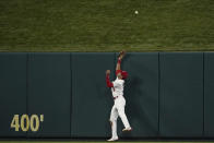 St. Louis Cardinals center fielder Dylan Carlson is unable to catch a two-run home run by Miami Marlins' Avisail Garcia during the ninth inning of a baseball game Wednesday, June 29, 2022, in St. Louis. (AP Photo/Jeff Roberson)