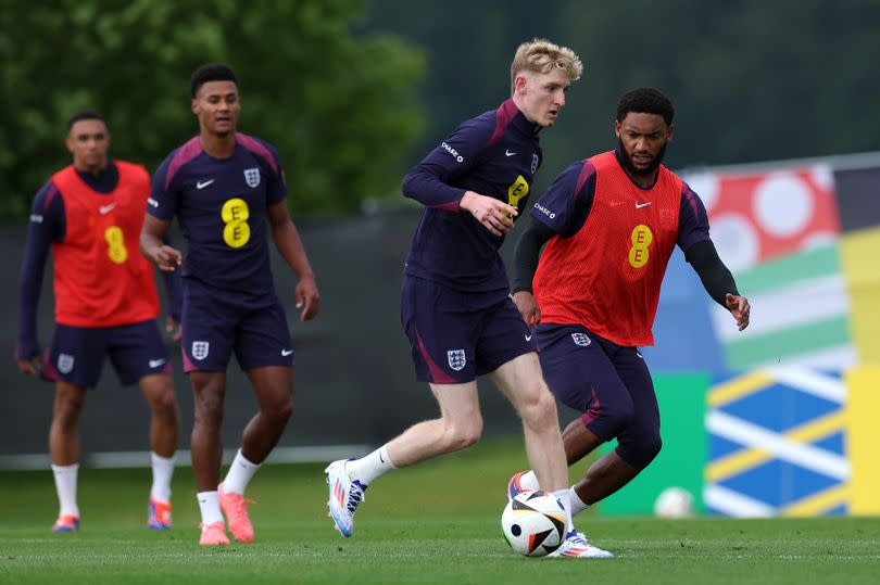 Anthony Gordon and Joe Gomez of England battle for possession during a training session at Spa & Golf Resort Weimarer Land on July 01, 2024 in Blankenhain, Germany.