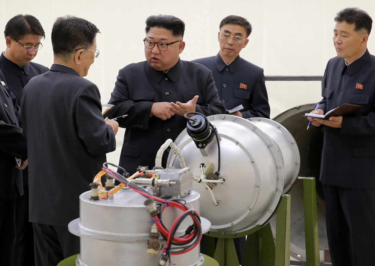 North Korean leader Kim Jong-un inspects a weapon in North Korea. (AP)