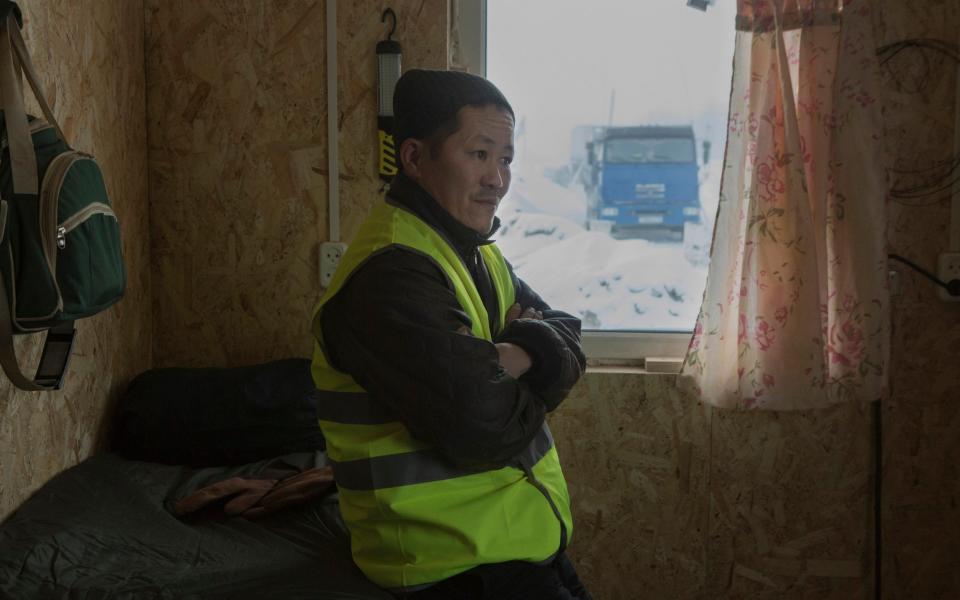 Arian Tastygim, a maintenance worker on the ice road outside Yakutsk - Maria Turchenkova 