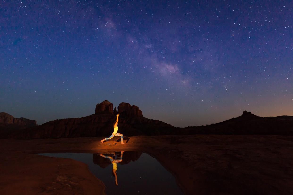 Woman Doing Yoga at Cathedral Rock Yoga in Sedona, Arizona, Under the Milky Way