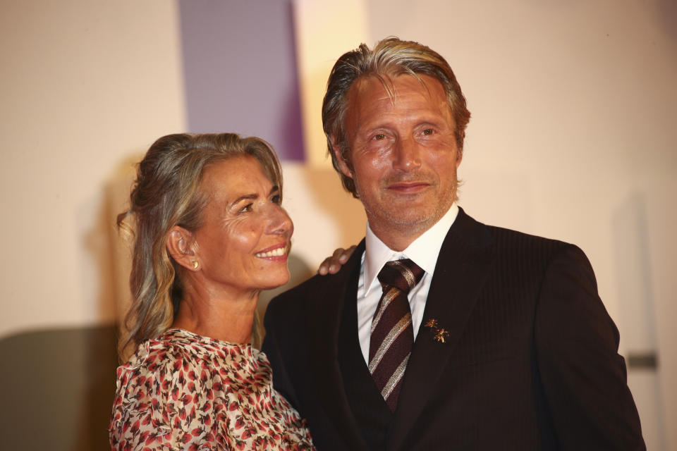 Actor Mads Mikkelsen, right, and Hanne Jacobsen pose for photographers upon arrival at the premiere of the film 'Miss Marx' during the 77th edition of the Venice Film Festival in Venice, Italy, Saturday, Sept. 5, 2020. (Photo by Joel C Ryan/Invision/AP)