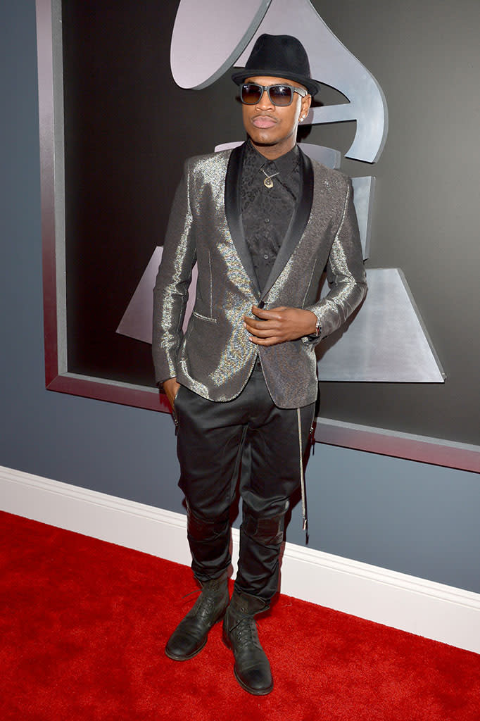 <b>Ne-Yo</b><br> <b>Grade: B-</b><br> Ne-Yo, who's always dressed to impress on any red carpet, made no exception for music's biggest night. The "Closer" singer came decked out in a silky silver-and-black suit, his signature fedora, shades, and — inexplicably — combat boots.