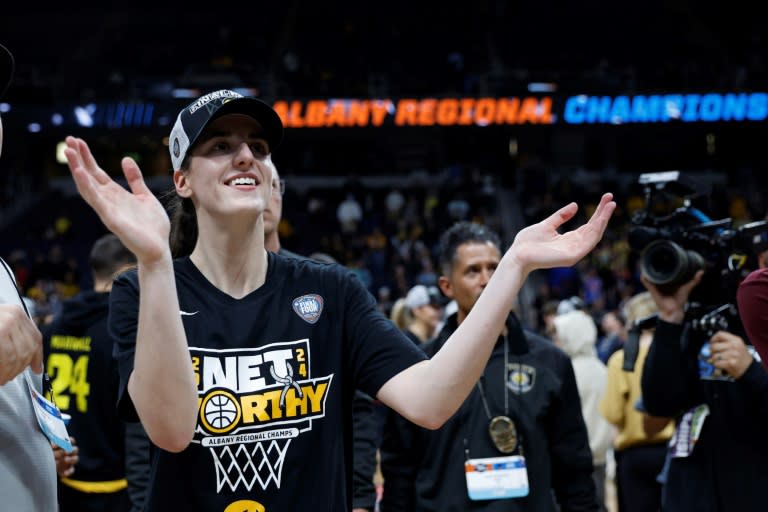 Iowa's <a class="link " href="https://sports.yahoo.com/ncaaw/players/64550/" data-i13n="sec:content-canvas;subsec:anchor_text;elm:context_link" data-ylk="slk:Caitlin Clark;sec:content-canvas;subsec:anchor_text;elm:context_link;itc:0">Caitlin Clark</a> celebrates after beating LSU 94-87 in what was the highest-rated US women's basketball telecast ever, with an audience of 12.3 million (Sarah Stier)