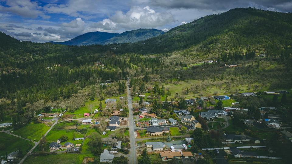 Aerial drone photo of Grants Pass, Southern Oregon, USA, and highway 5 traffic - Image.